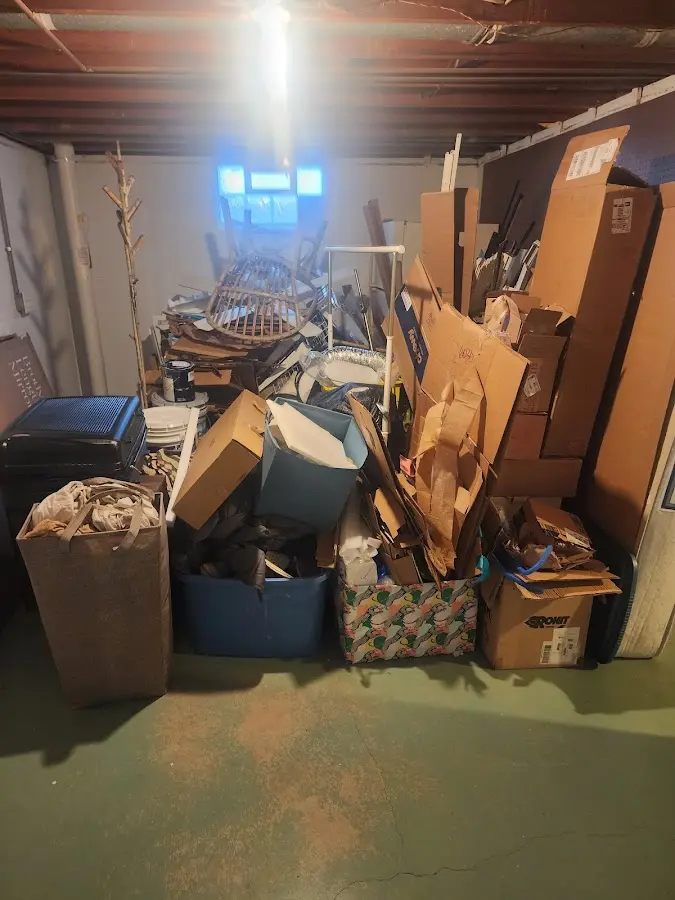 Roll-off dumpster container at job site for Yard Waste Dumpster Rental in Coventry